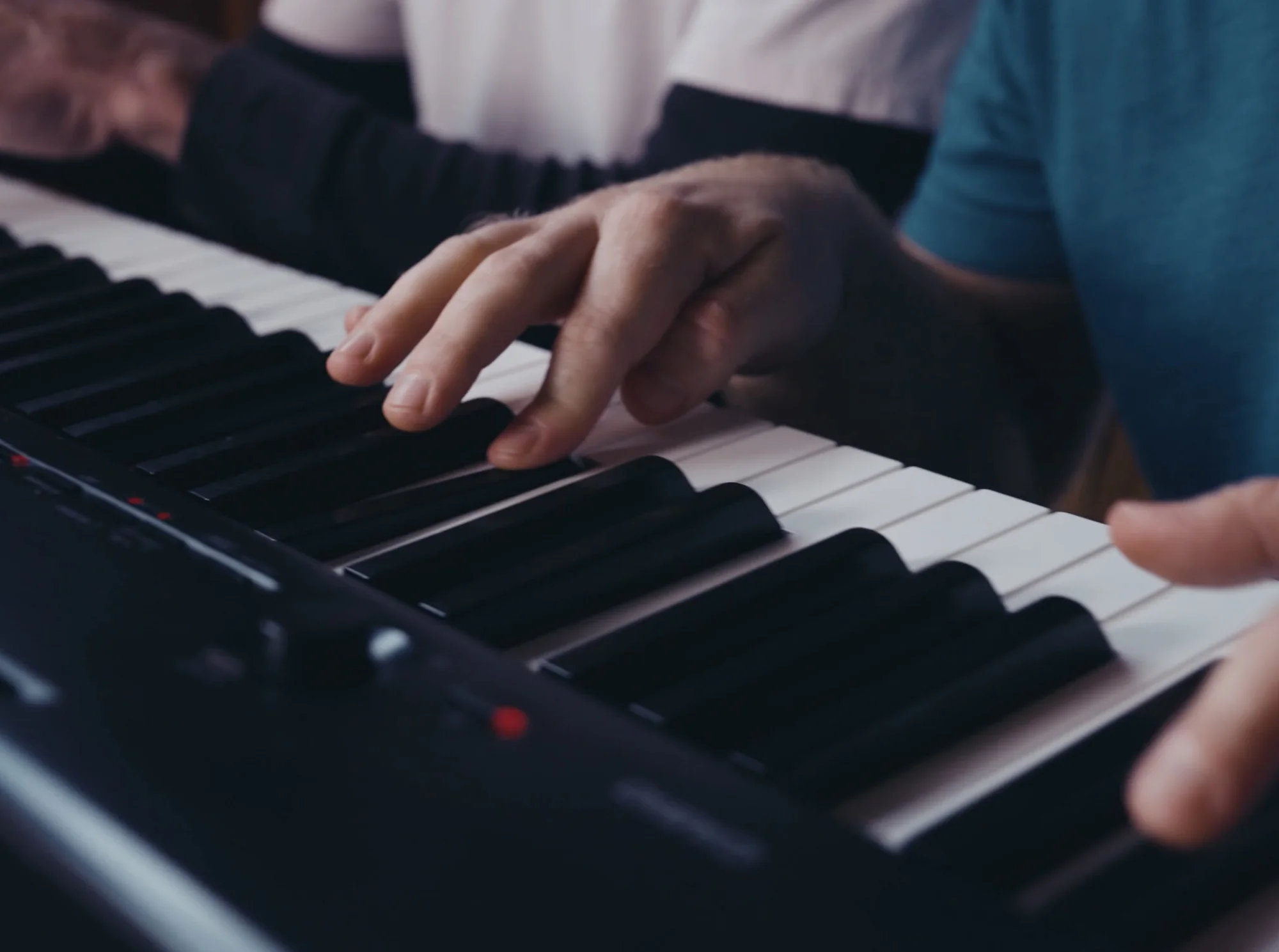 Hands at the piano keys during a lesson